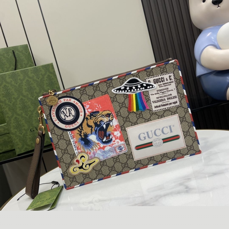 G*u*i clutch bags